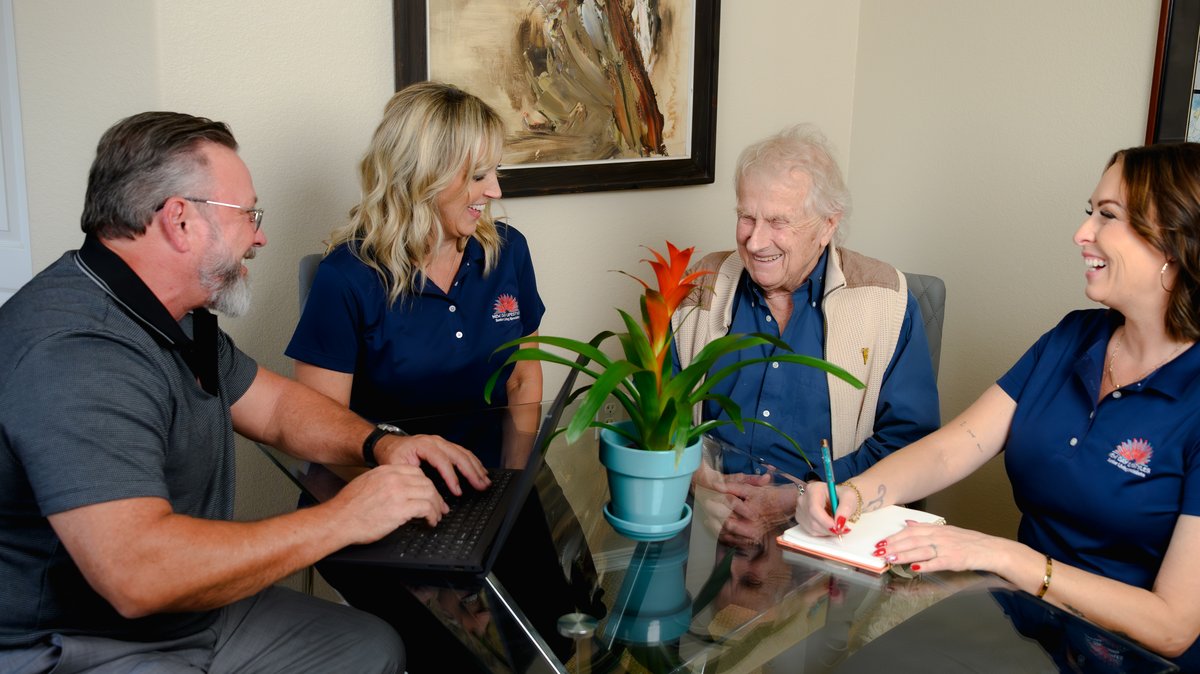 New Day Lifestyles advisors meeting a client at home for an in-person assessment